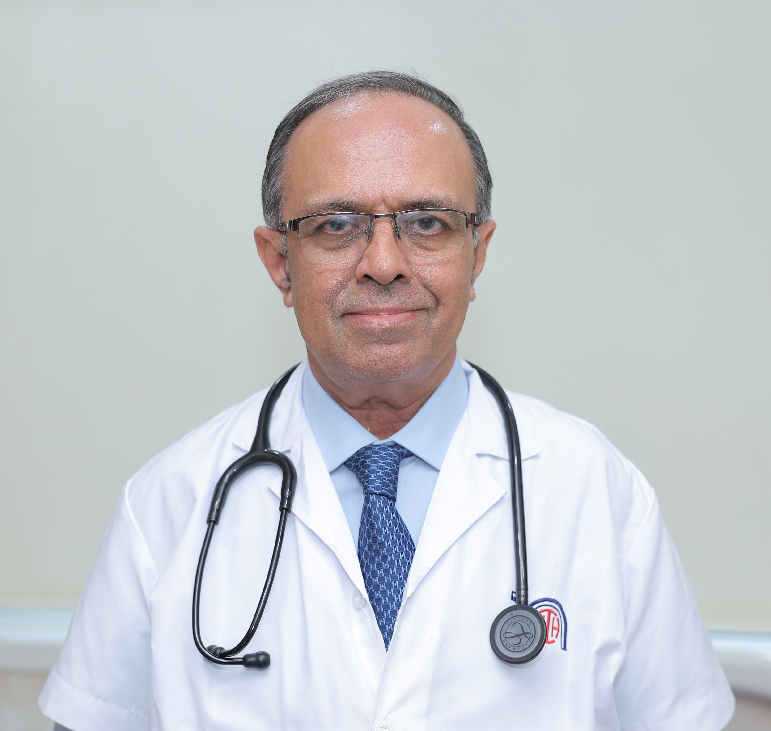Dr. Harish Bhatt